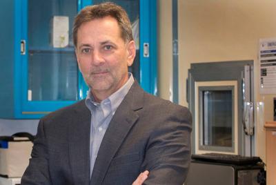 Dr. W. Larry Kenney